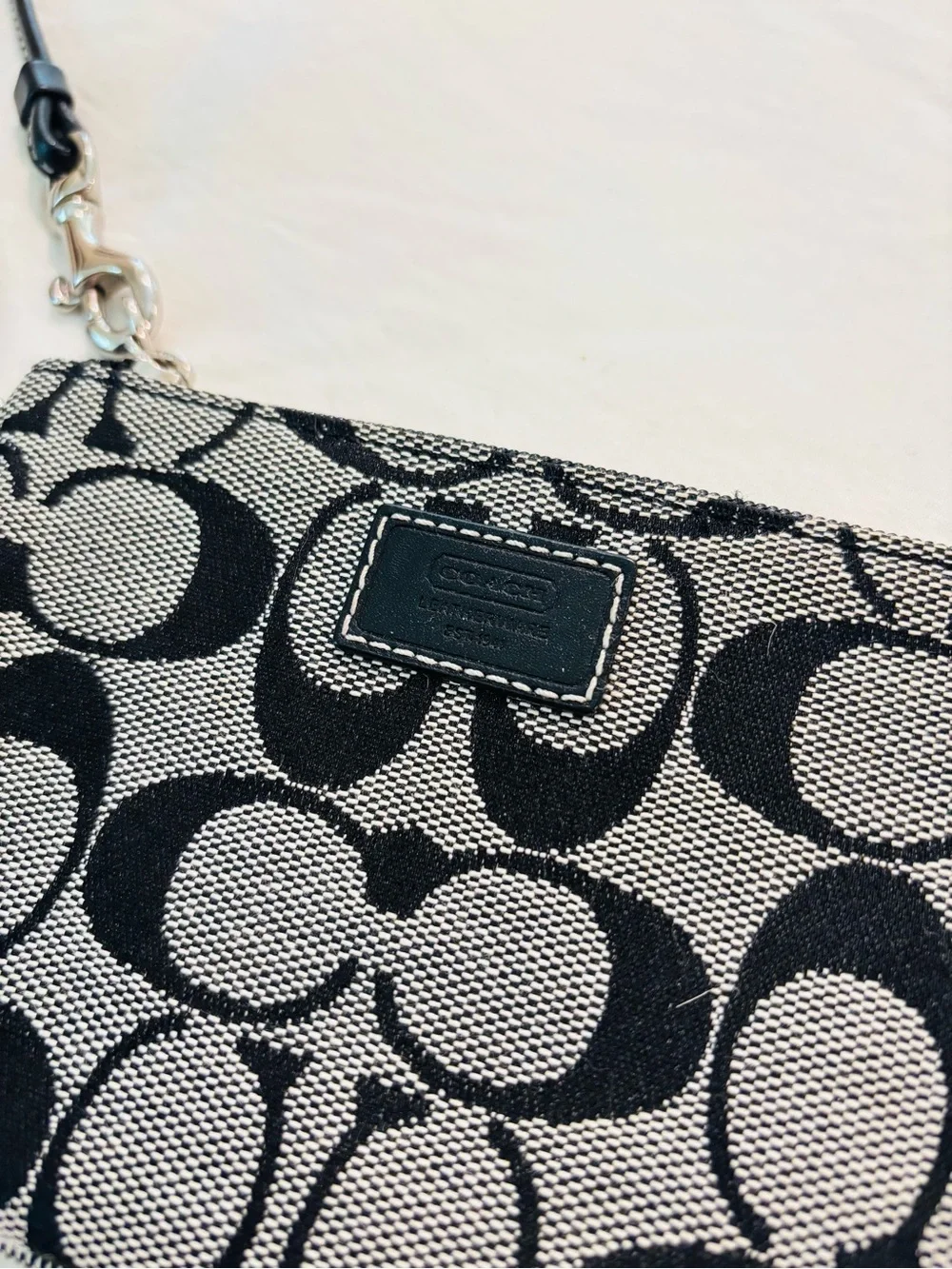 Coach Women’s Signature Pattern Canvas Mini Wristlet